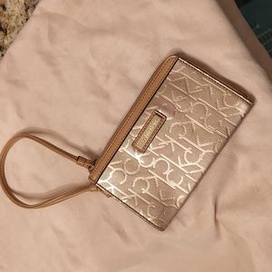 FREE, Calvin Klein wristlet, gold, leather